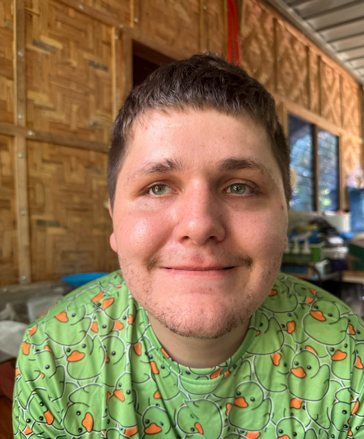 Mr. Blindbandit in the Philippines, wearing a green shirt
